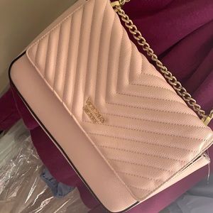 Baby pink Victoria’s Secret gold chain purse. Very cute. Excellent condition.